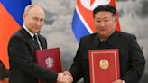 Putin and Kim enjoy joyride after signing military pact