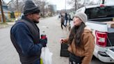 Volunteers deliver hot meals to unhoused people during frigid temperatures in Austin