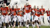 Miami's Calais Campbell leads his teammates onto the field before a game against Florida State at the Orange Bowl Stadium on Sept. 4, 2006, in Miami.