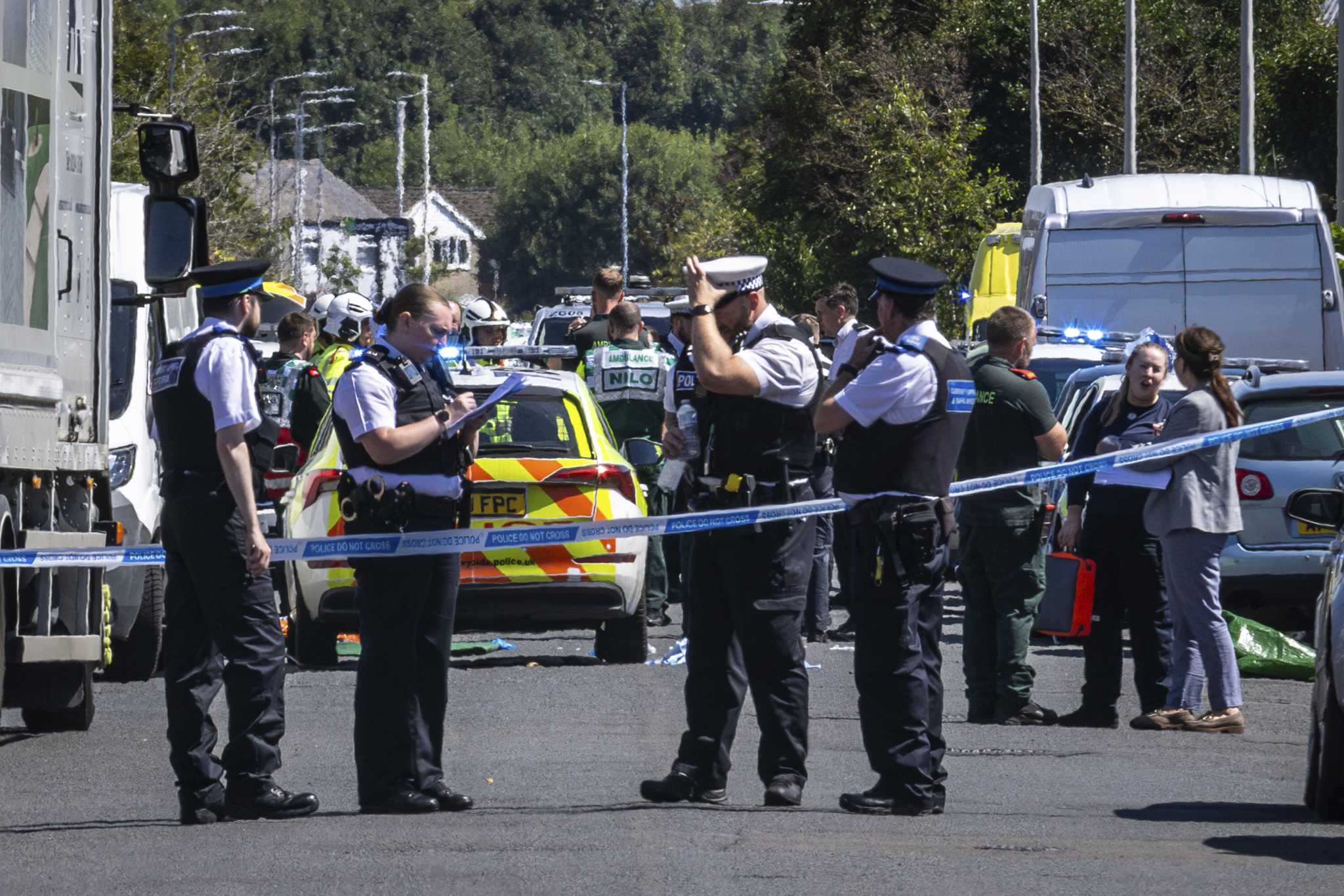 Children are among 8 stabbed in an attack in northwest England. A man is arrested