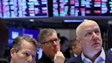Shares slip, dollar steady as markets assess Powell comments