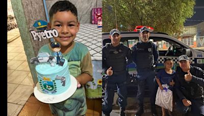 Fora do convencional: menino de 6 anos comemora aniversário dos sonhos com passeio em camburão da PM e ganha presente de policiais