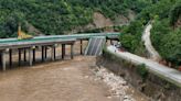 China flash floods: 12 dead, over 60 missing in bridge collapse