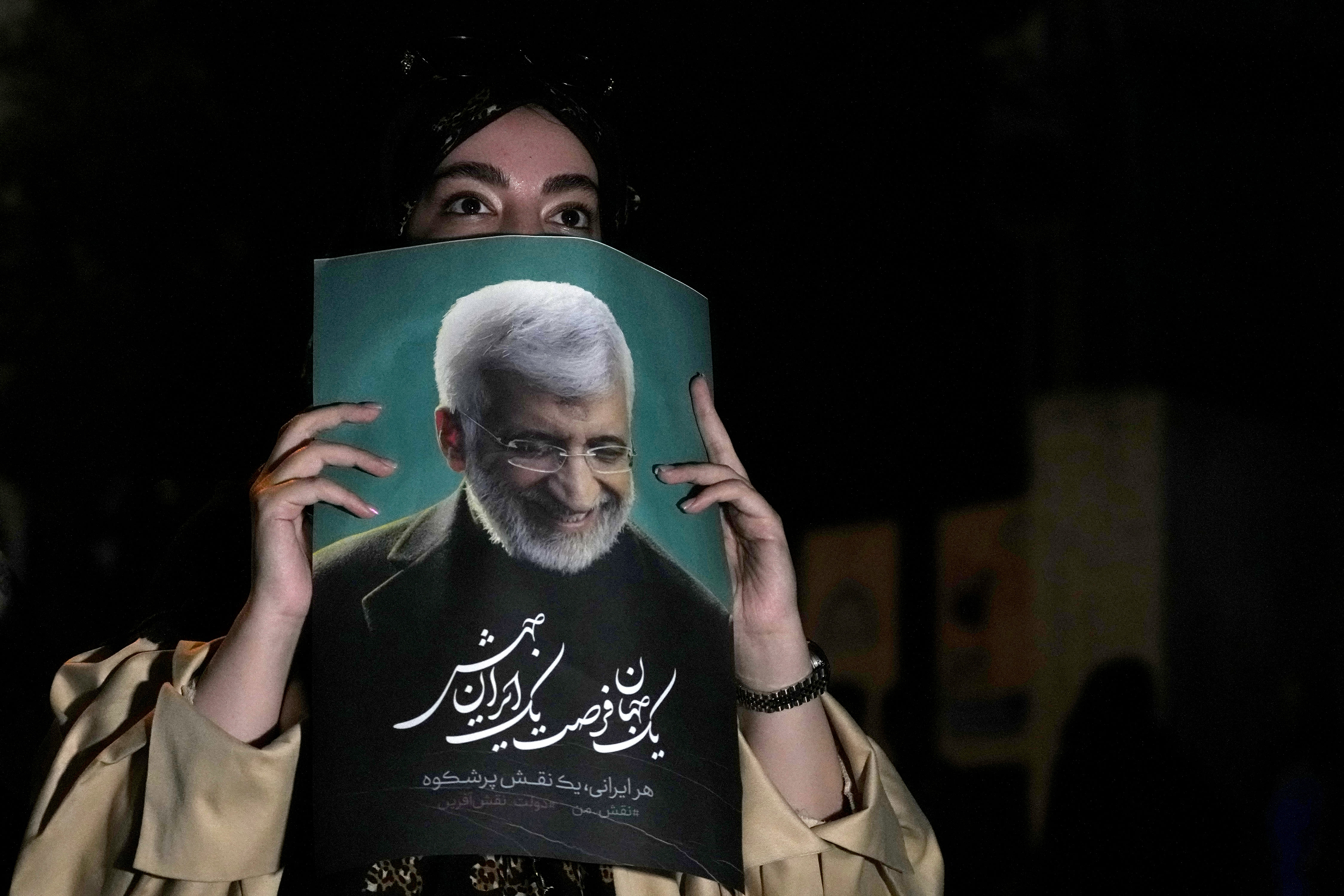 First candidate drops out of Iran presidential election, due to take place Friday amid voter apathy