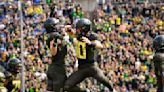 Nix puts up 5 TDs, No. 25 Oregon takes down No. 12 BYU 41-20