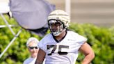 Taliese Fuaga knocking off the rust at left tackle in Saints rookie minicamp