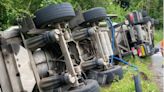 Driver taken to hospital as tanker carrying 20,000 litres of milk overturns