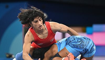 Indian wrestler Vinesh Phogat abruptly retires after disqualification at Olympics