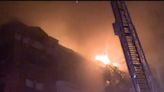 At least one person dead and 18 families displaced after huge blaze engulfs New Jersey apartment block