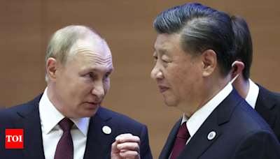 China's Xi tells Putin ready to 'expand' ties: state media - Times of India