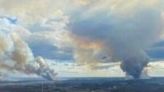 Parts of Canadian city in oil sands region evacuated as wildfire draws near