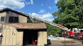 Local firefighters respond to pool house in flames at North Andover home