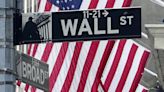 Wall Street slinks back from its records
