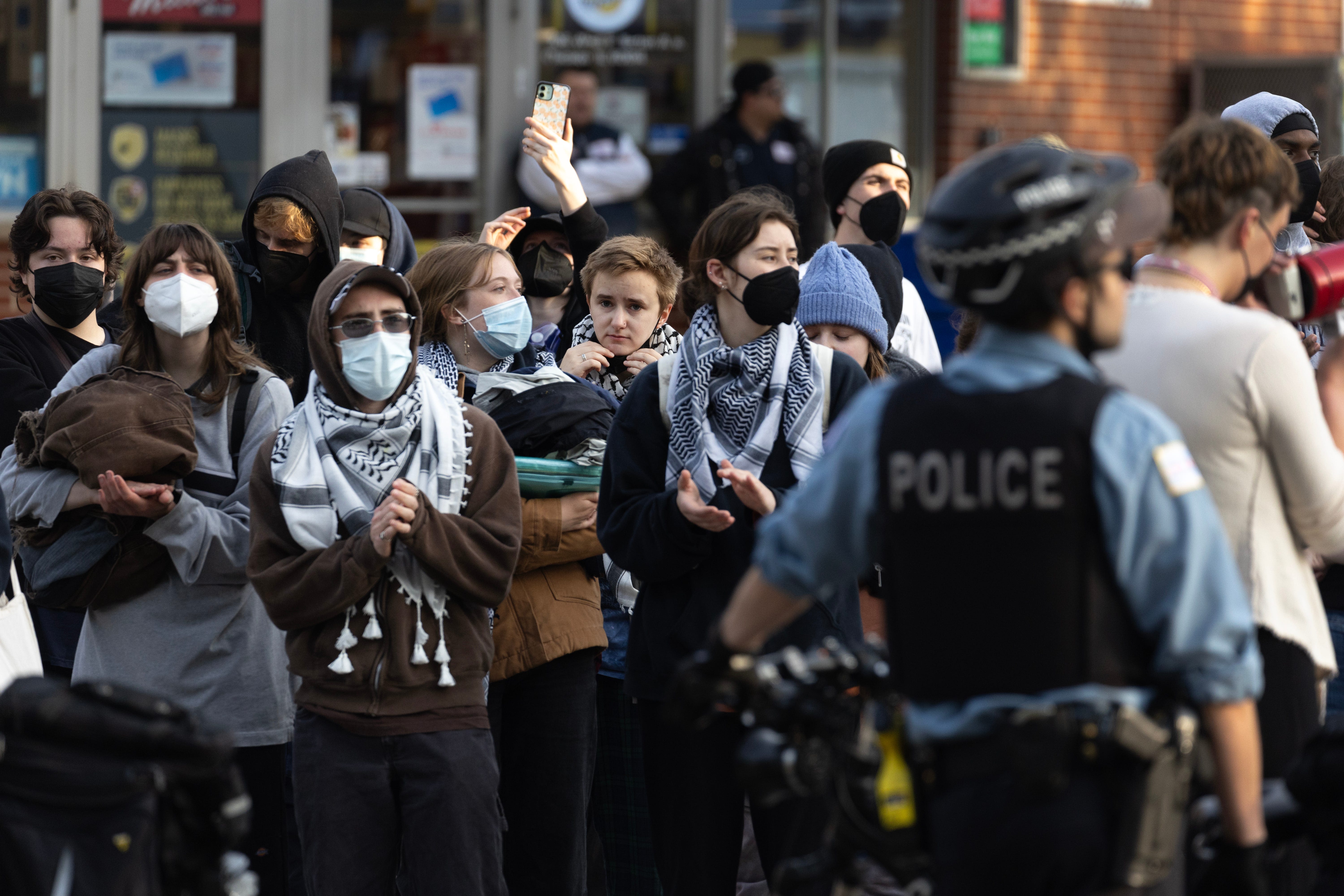 Masks are key tool against COVID-19. Should they be banned for war protesters?