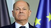 Scholz blasts 'cowardly' attack as ally struck on head in Berlin library