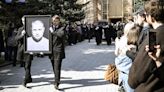 Hundreds attend assassinated Russian propagandist Vladlen Tatarsky funeral in Moscow