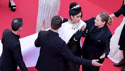 The same Cannes security guard went viral for shooing 4 celebs. What's going on?