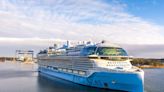 Watch the world's largest cruise ship pass under a bridge with only feet to spare