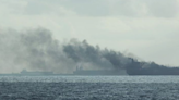 Two large oil tankers collide and catch fire near Singapore