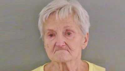 Retiree, 79, scowls in mugshot as she's banned for life from all Walmarts