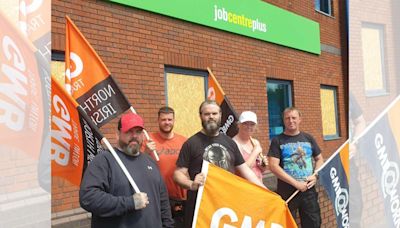 Windows of town’s Job Centre boarded up as security guards walk out on strike