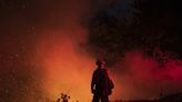 California firefighters make progress as wildfires push devastation and spread smoke across US West