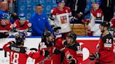 Canada beats Czechs 4-3 in OT to remain unbeaten, US tops Latvia 6-3 at hockey worlds