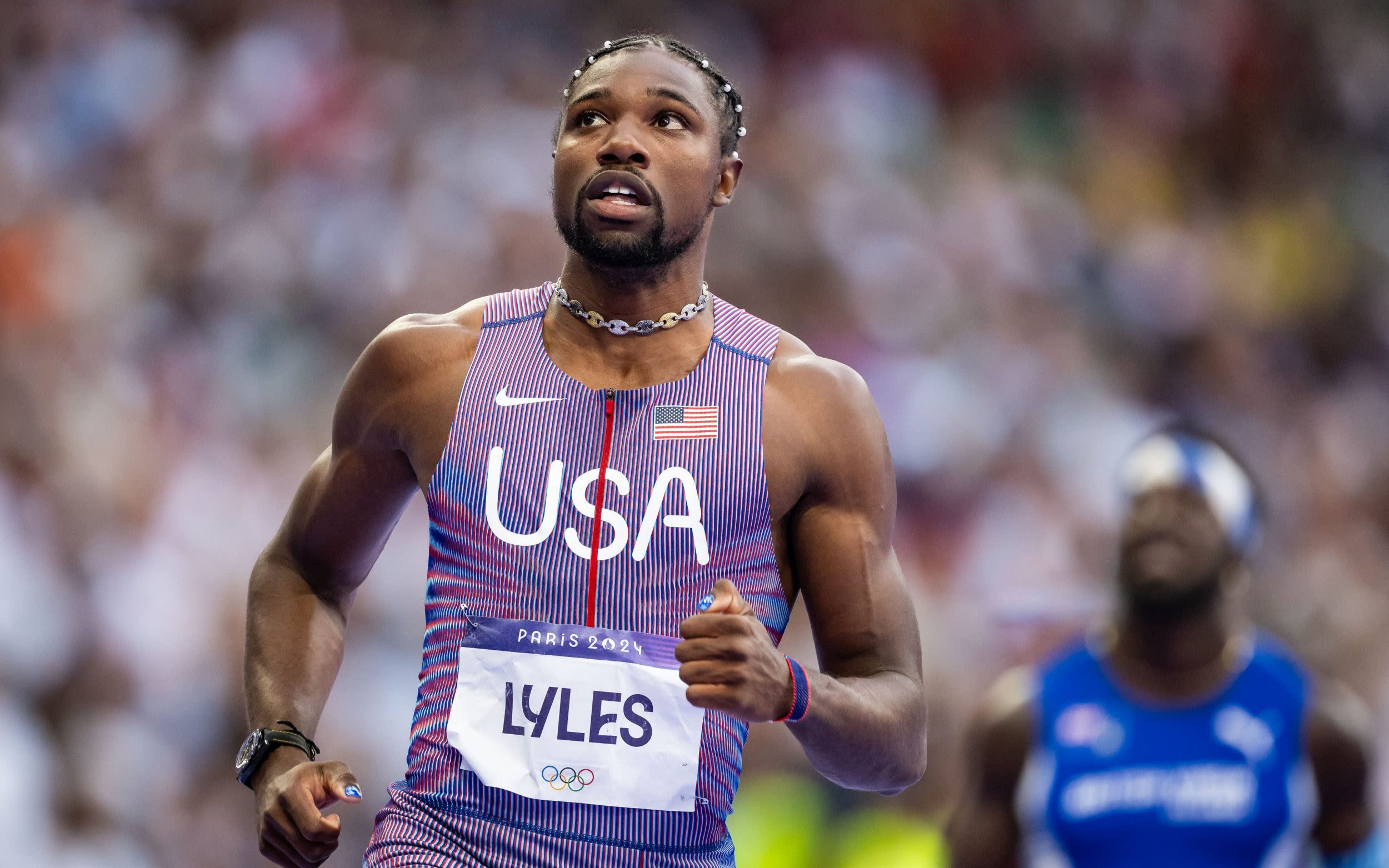 How Noah Lyles became fashion’s most in-demand man – hair pearls and all