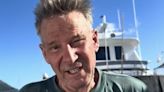 Sam Newman rushed to hospital after his boat set fire