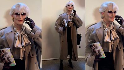 Drag queen faz cosplay de personagem da Meryl Streep em 'O Diabo Veste Prada' no desfile da Balenciaga, em Paris