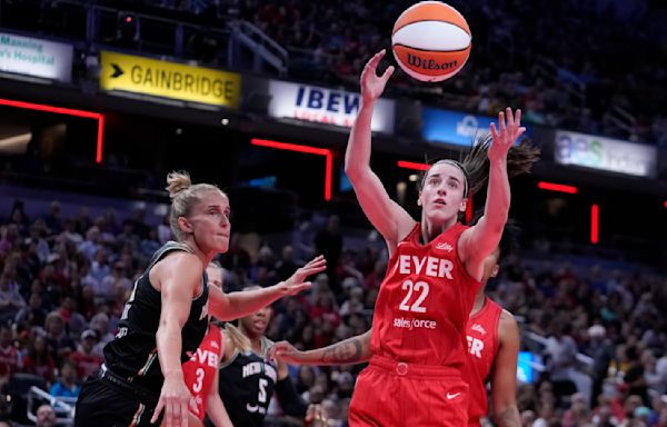 Caitlin Clark becomes first WNBA rookie to record a triple-double as Fever surge back to beat Liberty