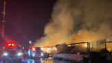 London firefighters battle stubborn barn blaze