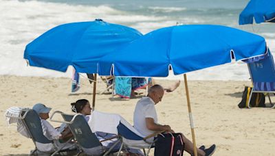 President Joe Biden lounges on beach amid retreat from public view