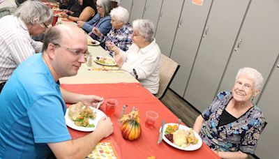 Seniors and newcomers share a Thanksgiving meal in Maple Ridge