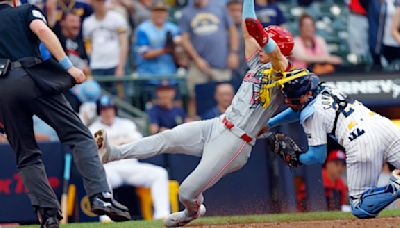 Milwaukee Brewers win when Cincinnati Reds’ tying run thrown out at plate in 9th inning