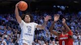 Davis scores 21 points as No. 4 North Carolina beats Louisville 86-70 for 7th straight win