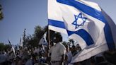 Israeli nationalists march through Palestinian area of Jerusalem, some chanting ‘Death to Arabs’