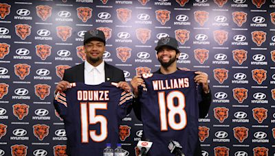 Why haven't Caleb Williams and Rome Odunze signed their rookie contracts?