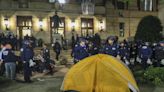 Columbia protesters gather outside NYPD headquarters after campus arrests. Live update expected.