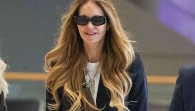 Elle Macpherson flashes smile as she seen for first time after cancer battle