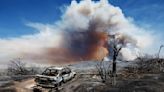 82 wildfires scorch U.S. West as another heat wave looms