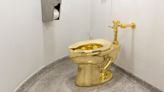 Three men deny charges over theft of gold toilet from Blenheim Palace