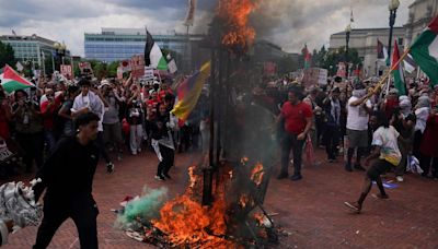 Protestors burn US flag, raise Palestine's as Netanyahu addresses US Congress