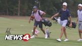 Charlie Woods hits the practice green ahead of Future Masters debut