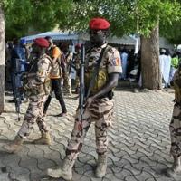 Guards patrolled as Chad's transitional president Mahamat Idriss Deby Itno (unseen) cast his ballot in the capital N'Djamena