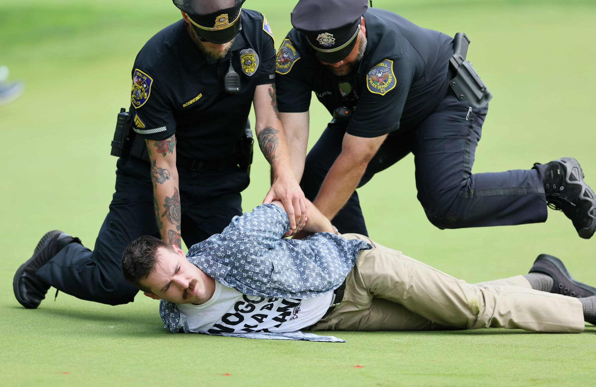 Travelers Championship protesters bailed out of jail by stranger with cash in a plastic bag