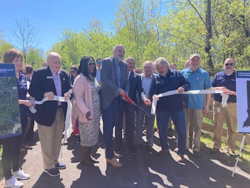 Holcomb marks 100th mile of Indiana trails program in Merrillville