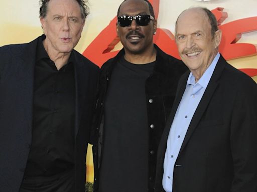 Stars of iconic 1980s movie franchise pose at premiere ahead of upcoming reboot