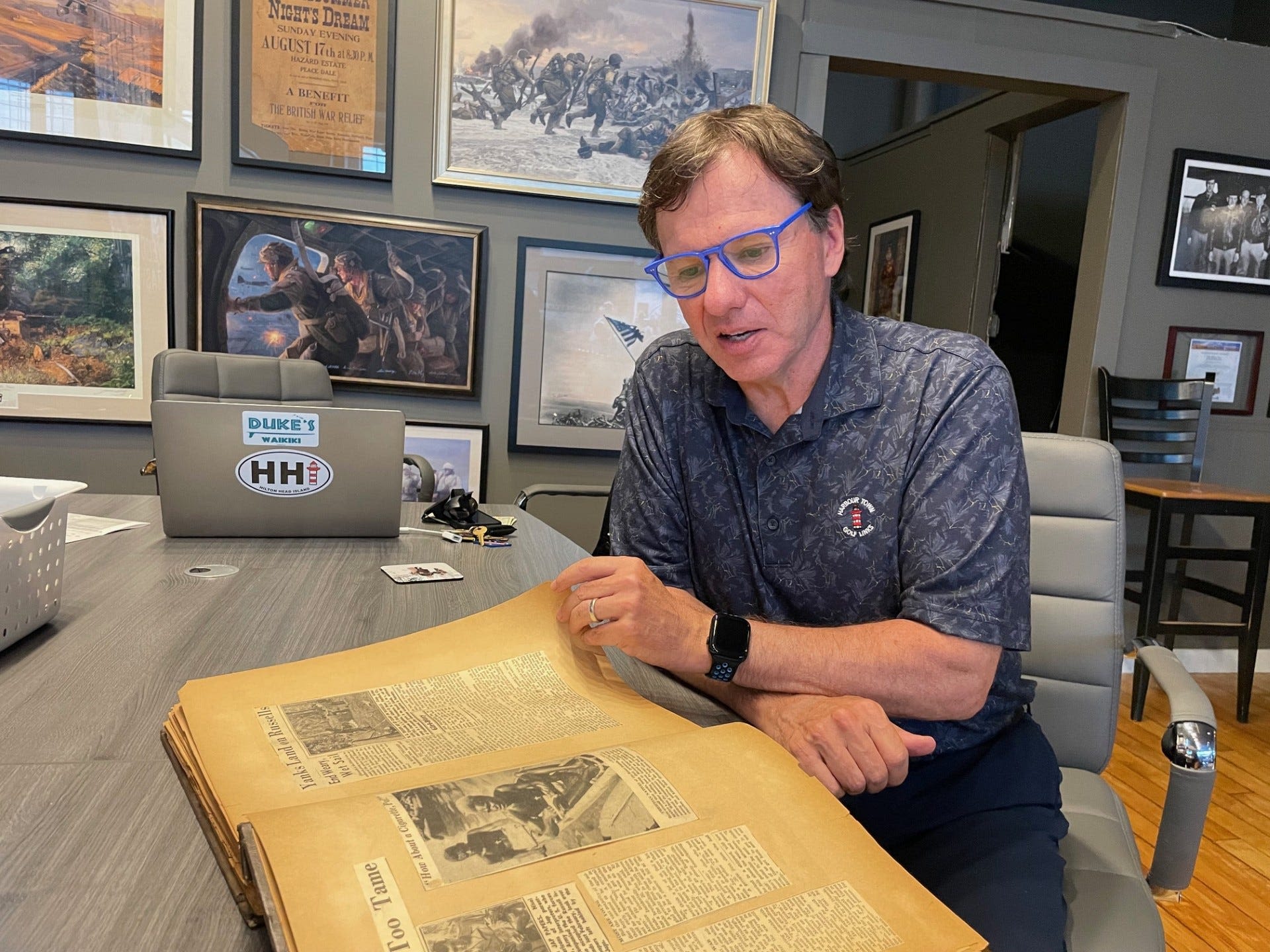 Scrapbooks purchased at auction chronicle path to Victory Day and role of RI during WWII