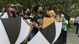 LIVE: Pro-Palestine students line up with umbrella shields at USF protest